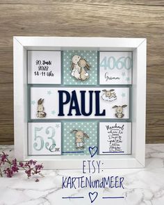 a white frame with some pictures on it and the words paul written in blue ink