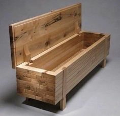 a wooden bench made out of wood planks