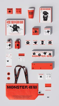 an assortment of business cards and stationery designed to look like the monster cafe logo