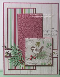 a close up of a card with a bird on the front and green leaves on the back