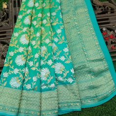 Preorder: Persian Green Pure Georgette Banarasi Jaal Lotus Saree - Khinkhwab Lotus Silk Saree, Green Pre-draped Saree With Traditional Patterns For Ceremonies, Green Banarasi Silk Saree For Eid, Green Saree With Pallu For Eid, Green Semi-stitched Paithani Silk Saree, Semi-stitched Green Paithani Silk Saree, Green Banarasi Silk Blouse Piece For Traditional Ceremonies, Green Dola Silk Saree With Self Design, Green Dola Silk Saree For Puja