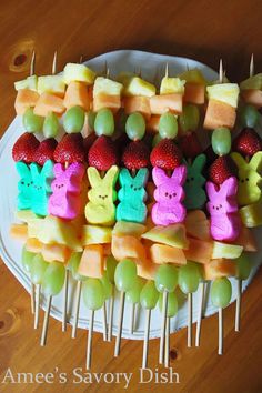 an image of some fruit kabobs on a plate