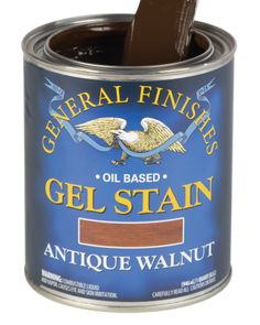 a can of gel stain with a wooden stick sticking out of the top and bottom