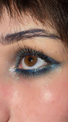 "Oh Christmas brow, oh Christmas brow, how lovely are your arches... Makeup Eye Aesthetic, Eyeshadow Aesthetic Looks, Brown Eyes Glitter Makeup, Blue Make Up Brown Eyes, Blue Mascara On Brown Eyes, Dark Blue Sparkly Makeup, Shiny Blue Makeup, Navy Eyeliner Brown Eyes, Brown Eyes With Blue Eyeshadow