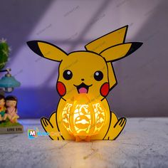 This is SVG, PDF, Studio Templates for creating Pikachu Lantern - Diy gifts for kids or Children's Room Decor - Svg Templates for Cricut projects This design you can also print by printer with pdf files or you can also cut them with cricut cutter or cameo4, ScanNcut it's very easy with svg file. And we have a detailed video tutorial on how to assemble. - How to make Pikachu Lantern: https://youtu.be/CM5WLbteJXo (copy link and paste on browser) In this package include files: - Printable PDF - SVG Templates For Cricut, Lantern Diy, Handmade Lanterns, Svg Templates, Projets Cricut, Diy Gifts For Kids, Diy Lanterns, Wedding Gift Baskets, Childrens Room Decor