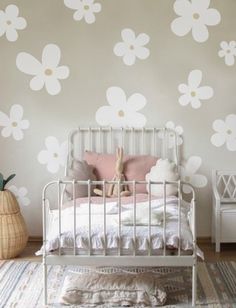 "[ITEM NO. 91309] Daisy Flowers Wall Decal [COLORS IN THIS LISTING] > Daisy Flowers: White > Flower Stamens : Beige [DECAL SET SIZE] Decals measure from 9\" wide to 9\" tall to 17\" wide to 18\" tall  [SET INCLUDED] ♥ 14 Daisy Flowers( 3 Large / 8 Medium / 3 Small) * The above items are all separated so you can place them wherever you wish. * This is an exclusive design only from pink n blue Baby! [INFORMATION ABOUT PRODUCT] * Included FREE application tool and detailed Step-by-step instruction