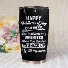 a black and white tumbler with the words happy father's day on it