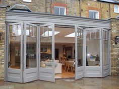 an open patio with french doors leading into the living room