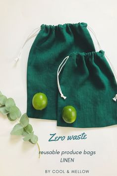 two green apples sitting on top of each other in a drawstring bag with the words zero waste