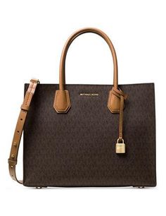 Classic monograms distinguish a MICHAEL Michael Kors convertible tote furnished with double handles and a sleek shoulder strap for chic work-to-weekend carry.12-1/2"W x 9-3/4"H x 5-1/2"D; (width is measured across bottom of tote)5-1/2"L double handles; 15-3/4" to 18-14"L adjustable strapOpen topGold-tone exterior hardware1 interior center zip compartment with 1 zip pocket insideMK Signature Double Sided Coated Twill faux leather; lining: polyesterColor: Brown Sac Michael Kors, Michael Kors Mercer, Bags Michael Kors, Womens Designer Handbags, Brown Tote, Brown Purses, Purse Styles, Tote Handbag, Purses Michael Kors