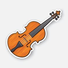 an orange violin sticker sitting on top of a white surface with the strings down