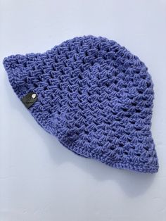 This handmade crochet grape bucket hat is perfect for that reading day at the beach or paired with your favorite sun dress! I loved making this piece 🤍 This item is made from 100% acrylic yarn. Casual Purple Sun Hat For Summer, Knitted Yarn Sun Hat For Beach, Knitted Yarn Sun Hat For Vacation, Knitted Sun Hat For The Beach, Knitted Bucket Hat For The Beach, One Size Hand Knitted Crochet Hat For Vacation, Hand Knitted Yarn Sun Hat For Beach, Knitted Yarn Sun Hat For The Beach, Hand Knitted Crochet Hat For Beach