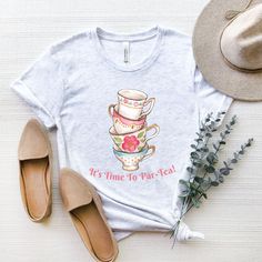 This super cute Tea Party Shirt is for everyone who loves tea!  Wear it for your next tea party! Adult Unisex T-Shirt Bella and Canvas 3001 *If you are interested in purchasing this shirt in a color or style (V-NECK) that is not listed above, please contact me and I will see what I can do!  I have added a color chart for you to reference, but please note that all colors may not be available. *If you really love this design but would like it on a different garment (sweatshirt, tank top, mug, bag, Tea Party Adult, Bachelorette Tea Party, Par Tea, Tee Party, Party Kleidung, Mad Hatter Tea, Party Shirts, Color Chart, Jersey T Shirt