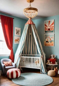 a baby's room with blue walls and red drapes on the ceiling, striped curtains