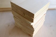 several pieces of plywood are stacked on top of each other in order to be finished