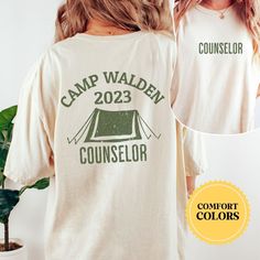 Introducing our one-of-a-kind Custom Camp Counselor Shirt, perfect for those who love the great outdoors and want to make a statement! This Personalized Camp Counselor Shirt is designed to celebrate your unique camp experience and create lasting memories. Customize the shirt if you are a camp in need of counselor shirts for your crew.  Shipping Update: Orders will now be shipped out in 3-5 business days after ordered! Please let me know if you need rush shipping options or have any questions about delivery time. Thank you! :) More Info ------------------------------------------------------------------------------------------------------ 1. MAKE SURE THAT YOU HAVE READ ALL PERTINENT INFORMATION AND YOU HAVE SCROLLED THROUGH ALL OF THE PHOTOS. 2. ONCE THAT HAS BEEN COMPLETED, PICK YOUR SHIRT Camp Counselor Shirt, Summer Green Top For Camping, Green Summer Top For Camping, Pre-shrunk Camp Shirt For Summer Outdoors, Pre-shrunk Cotton Camp Shirt For Camping, White Cotton Camp Shirt For Camping, White Cotton Camp Shirt, Short Sleeve Camp Shirt With Letter Print For Hiking, Outdoor Short Sleeve Camp Shirt With Letter Print