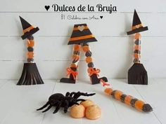 halloween decorations made out of candy sticks and witch hats