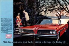 an advertisement for a red car with two people standing next to it and another man in the background