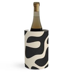 a bottle of wine in a black and white holder