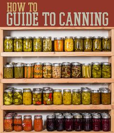 a wooden shelf filled with lots of pickles and canned food in jars on top of it