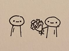 two stick figures are holding flowers in their hands