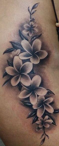 a woman's stomach with flowers on it