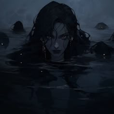 a woman floating in the water at night