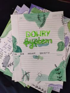 several papers are stacked on top of each other with the words dorky system written in green