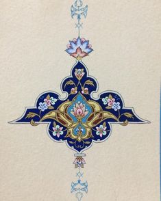 an intricately designed card with blue and gold designs