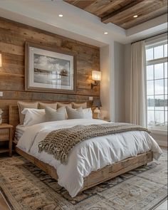 a bedroom with wood paneled walls and white bedding, along with an area rug on the floor