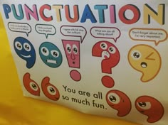 an advertisement for punctuation is displayed on a yellow tablecloth with cartoon faces and speech bubbles