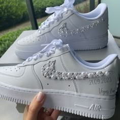 Be the star of your wedding day in these Pearl Rhinestones Custom Air Force 1s. Elevate your look with this bold bling and stand out with every step! Strap yourself in and get ready for the adventure of a lifetime! 🔥 100% genuine, Brand New.👟 Custom sneakers.💫 Every pair is hand-made to order.✨ Best quality waterproof and scratch-proof paints used.✨ 1000+ satisfied customers across various platforms. 🌎Free worldwide shipping,shipping within 5-12 working days🎁 Treat the shoes as art as they Bedazzled Shoes Diy, Bedazzled Shoes, Shoes For School, Wedding Sneakers, Air Force 1s, Custom Air Force 1, Baskets Nike, Cute Nike Shoes, Cute Nikes