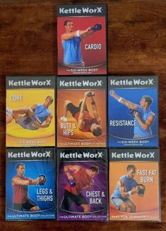 six dvd's of kettle work workouts for men and women on a wooden table