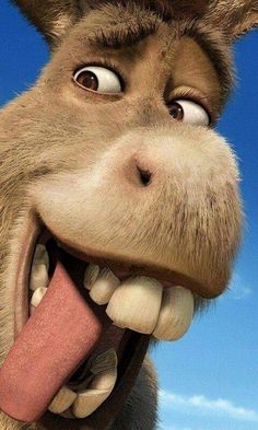 an animated donkey with its tongue out and his mouth wide open in front of the camera