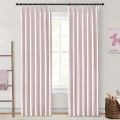 the pink curtains are hanging in front of a window with an elephant painting on it