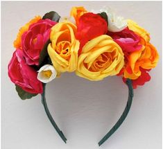 a headband with flowers on top of it