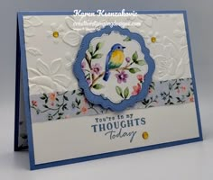 a blue and white greeting card with a bird on it's side, which reads you're in my thoughts today