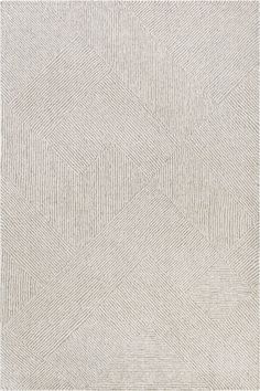 a white rug with an abstract design on the bottom, and a diamond pattern in the middle