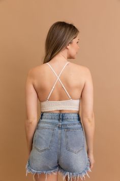 Get ready to add a touch of style to your summer wardrobe with our Floral Jacquard Scoop Neck Bralette! Perfect for any summer outfit, this bralette is also a must-have for your next vacation. Embrace a stylish and fun look with our soft and trendy design. Don't miss out on this cute addition to your closet! #lovemyleto 52% Nylon 40% Rayon 8% Spandex Imported Beach Lace Crop Top With Built-in Bra, Feminine Camisole With Built-in Bra For Vacation, Stretch Camisole With Built-in Bra For Day Out, Beach Camisole Crop Top With Built-in Bra, Trendy Beige Crop Top With Built-in Bra, Camisole Crop Top With Built-in Bra For Vacation, Summer Lace Crop Top With Built-in Bra, White Camisole Bra For Summer, Beach Bra With Spaghetti Straps And Built-in Bra