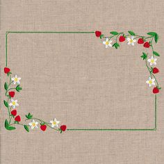 a piece of cloth with red and white flowers on it, in the shape of a rectangle