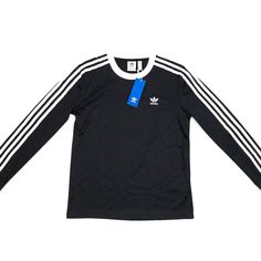 Brand New With Original Tags Attached Adidas Originals 3-Stripes All-Over Black Long-Sleeve Shirt Available In Women’s Size Xs & Small; See Second To Last Picture For Measurements Of The Size Small; Color- Black/White; All-Over Adidas Print; Long-Sleeve; Ribbed Sleeve Cuffs & Neckline; 3-Stripes Down Both Sleeves; 56% Polyester 26% (Recycled) Polyester 18% Spandex Additional Details Above Same Day/Next Day Shipping All Actual Photos No Trades No Returns Firm Adidas Sweatshirt Outfit, Bison Board, Adidas Shirt Women, Adidas Long Sleeve Shirt, Adidas Long Sleeve, Long Sleeve Running Shirt, Adidas Three Stripes, Blue Long Sleeve Tops, Black Long Sleeve Shirt