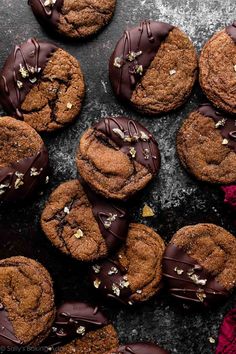 chocolate covered cookies with nuts on top