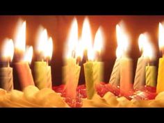 many candles are lit on a birthday cake