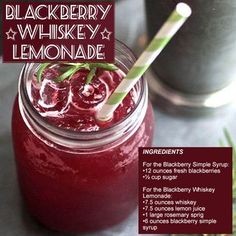 the ingredients for blackberry whiskey lemonade in a mason jar