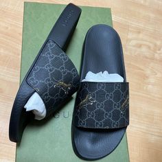 100% Authentic Uk 9 = Us 9.5 New Luxury Gucci Slides With Rubber Sole, Gucci Black Sandals With Rubber Sole, Black Gucci Sandals With Rubber Sole, Black Gucci Slides With Rubber Sole, Gucci Black Slides With Cushioned Footbed, Gucci Black Leather Slides, Black Leather Gucci Slides, Gucci Black Flat Slides, Gucci Black Slip-on Sandals