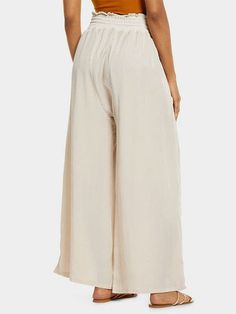 Step into comfort and fashion with our Women's High-Waisted Wide-Leg Pants. Made from high-quality polyester fabric, these loose casual trousers are designed to elevate your everyday look. Style: Wide-leg pants Fit: Loose fit Waist: High-waisted Thickness: Medium Popular Elements: High-waisted wide-leg design Color: Off-White Sizes Available: S, M, L These pants are not only stylish but also versatile, perfect for a day out with friends or a casual work setting. The high-waisted design flatters Baggy Solid Color Bottoms For Vacation, Baggy Solid Color Pants For Vacation, High Waist Solid Color Pants For Vacation, Wide Leg Bottoms In Solid Color For Vacation, Wide Leg Solid Color Vacation Bottoms, Vacation Wide Leg Bottoms Solid Color, Vacation Wide Leg Bottoms In Solid Color, Vacation Solid Color Wide Leg Bottoms, Spring Solid Beige Wide Leg Pants