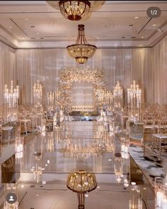 a room filled with lots of candles and chandeliers