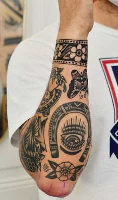 a man with a tattoo on his arm