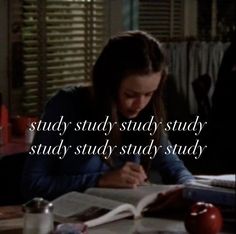 a woman sitting at a table in front of an open book with the words, study study study study study study study study study study study study study study study study study