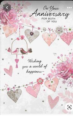 an anniversary card with pink flowers and hearts